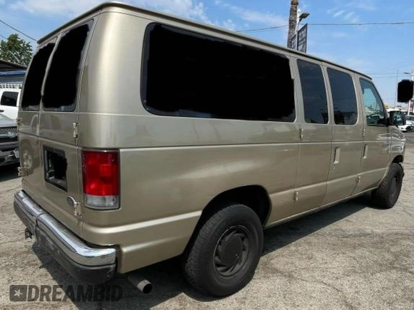 1999 Ford Econoline Passenger XL with VIN 1FMRE11L6XHB70992, listed as a Copart auction lot 78546004 with 264,378 mi miles and Clean title. Bid and sale history available at DreamBid. Image 4.