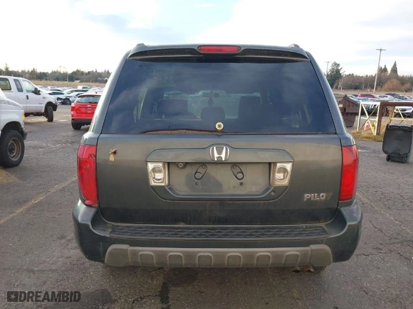 2005 Honda Pilot EX with VIN 2HKYF18455H565742, listed as a IAAI auction lot 41264177 with 304,396 mi miles. Bid and sale history available at carsss.com. Image 16.