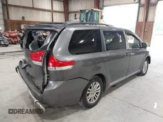 2011 Toyota Sienna XLE AAS with VIN 5TDYK3DC0BS063232, listed as a IAAI auction lot 42433187 with 198,252 mi miles and . Bid and sale history available at DreamBid. Image 4.