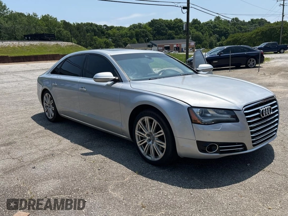 2013 Audi A8 3.0L with VIN WAURGAFD6DN010072, listed as a Copart auction lot 57999295 with 116,555 mi miles and Salvage title. Bid and sale history available at DreamBid. Image 1.
