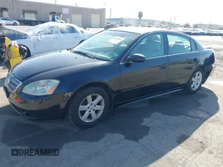 2003 Nissan Altima S with VIN 1N4AL11D93C268136, listed as a IAAI auction lot 41960386 with 181,444 mi miles. Bid and sale history available at carsss.com. Image 17.
