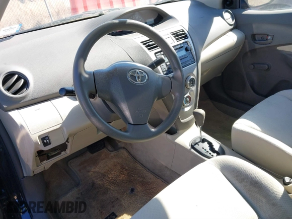 2009 Toyota Yaris z VIN JTDBT903291338232, wystawiony jako IAAI lot #41699916 z przebiegiem Nie podano mil oraz . Historia ofert i sprzedaży dostępna na DreamBid. Obrazek 12.