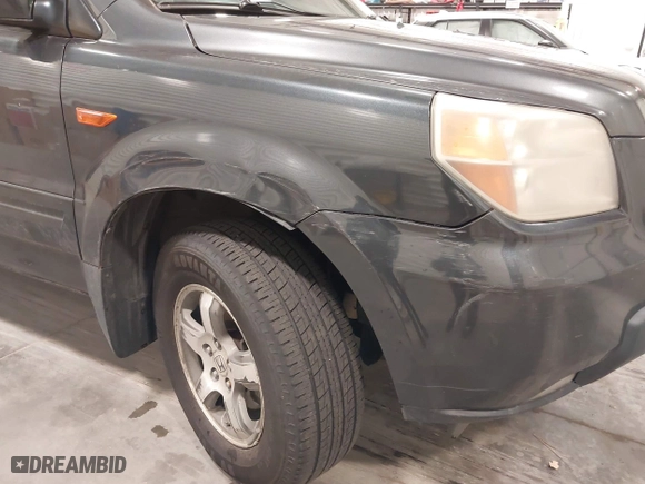 2006 Honda Pilot EX with VIN 2HKYF18466H504644, listed as a IAAI auction lot 41949350 with 256,464 mi miles. Bid and sale history available at carsss.com. Image 6.