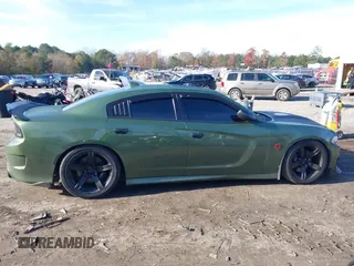 2019 Dodge Charger Scat Pack with VIN 2C3CDXGJ4KH572619, listed as a IAAI auction lot 40973015 with 40,148 mi miles and . Bid and sale history available at DreamBid. Image 13.