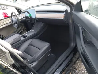 2022 Tesla Model Y Performance with VIN 7SAYGDEF0NF406262, listed as a IAAI auction lot 41132514 with 27,171 mi miles. Bid and sale history available at carsss.com. Image 5.