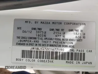 2012 Mazda 3 i Touring with VIN JM1BL1V72C1677190, listed as a IAAI auction lot 42076143 with 162,192 mi miles and . Bid and sale history available at DreamBid. Image 9.