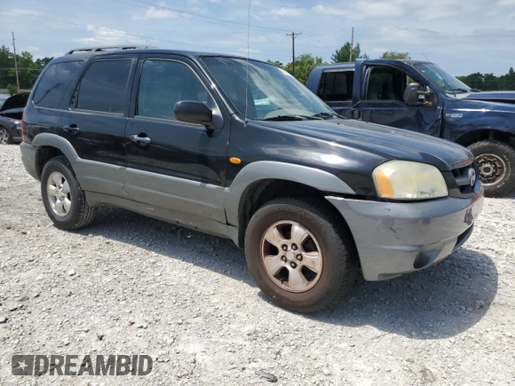 2002 Mazda Tribute LX with VIN 4F2YU09182KM12760, listed as a Copart auction lot 61292724 with 226,479 mi miles and Salvage Title. Bid and sale history available at carsss.com. Image 4.