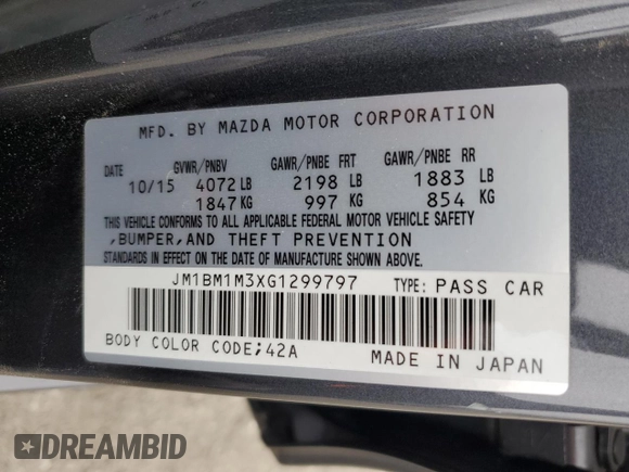 2016 Mazda 3 S Touring with VIN JM1BM1M3XG1299797, listed as a Copart auction lot 54344485 with Not provided miles and Salvage title. Bid and sale history available at DreamBid. Image 12.
