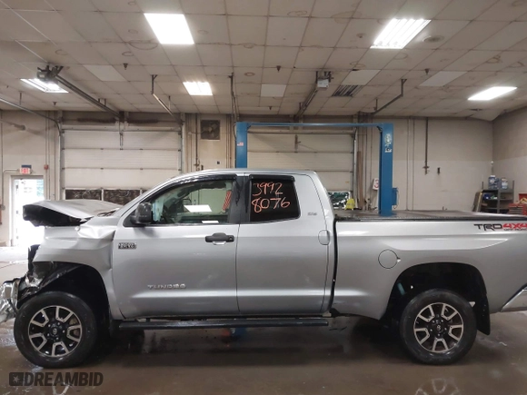 2014 Toyota Tundra 4WD Truck SR with VIN 5TFUY5F17EX357035, listed as a IAAI auction lot 39928076 with 129,831 mi miles. Bid and sale history available at carsss.com. Image 14.