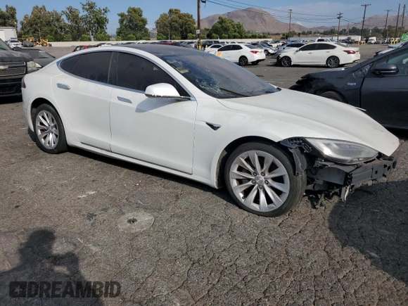 2016 Tesla Model S 90D with VIN 5YJSA1E25GF176897, listed as a Copart auction lot 65610575 with Not provided miles and Clean title. Bid and sale history available at DreamBid. Image 4.