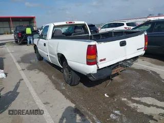 2000 GMC New Sierra 1500 SL with VIN 1GTEC14VXYE124476, listed as a IAAI auction lot 41918838 with 184,796 mi miles. Bid and sale history available at carsss.com. Image 3.
