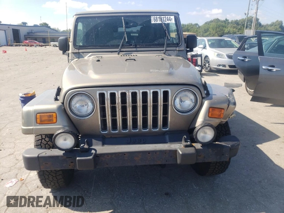 2003 Jeep Wrangler Sahara with VIN 1J4FA59S23P303845, listed as a Copart auction lot 68101244 with 141,753 mi miles and Clean Title. Bid and sale history available at carsss.com. Image 5.