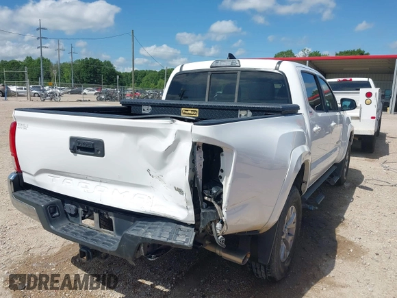 2017 Toyota Tacoma SR5 with VIN 5TFAZ5CN6HX035708, listed as a IAAI auction lot 42117129 with 122,100 mi miles and . Bid and sale history available at DreamBid. Image 6.