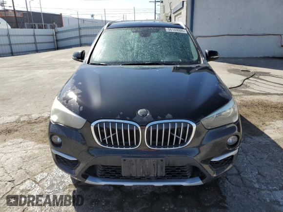 2017 BMW X1 sDrive28i z VIN WBXHU7C34HP924632, wystawiony jako Copart lot #56169005 z przebiegiem 203 811 mil mil oraz Czysty tytuł • Clean title. Historia ofert i sprzedaży dostępna na DreamBid. Obrazek 5.