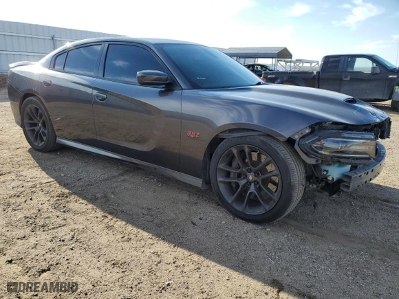 2021 Dodge Charger Scat Pack Widebody with VIN 2C3CDXGJ1MH677850, listed as a Copart auction lot 49909025 with 104,332 mi miles and Salvage Title. Bid and sale history available at carsss.com. Image 4.