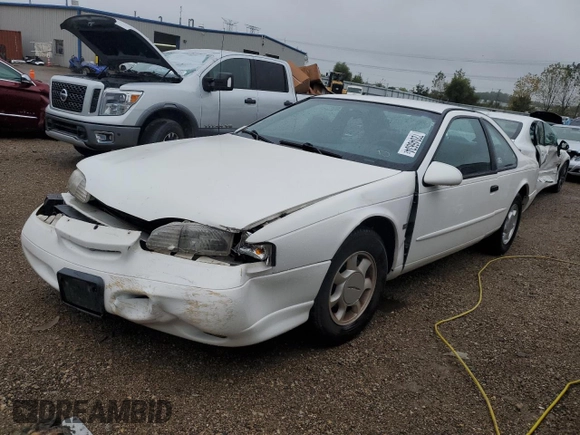 1994 Ford Thunderbird LX with VIN 1FALP62W5RH211700, listed as a Copart auction lot 72046634 with 61,570 mi miles and Salvage Title. Bid and sale history available at DreamBid. Image 1.
