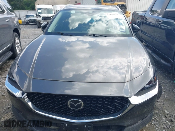 2023 Mazda CX-30 S Premium with VIN 3MVDMBDM2PM526974, listed as a IAAI auction lot 42155416 with 22,428 mi miles and . Bid and sale history available at carsss.com. Image 12.