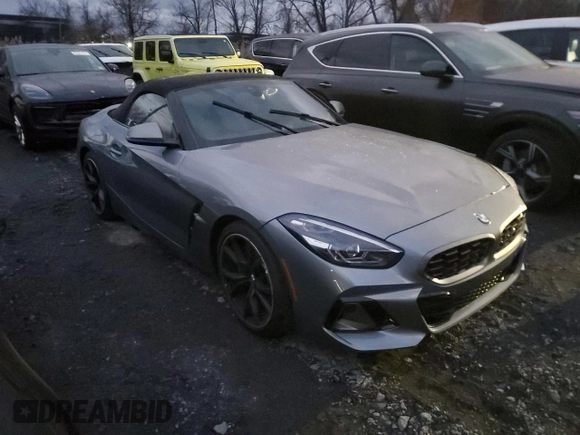 2024 BMW Z4 sDriveM40i with VIN WBAHF9C02RWY35106, listed as a Copart auction lot 82878254 with 3,199 mi miles and Salvage title. Bid and sale history available at DreamBid. Image 4.