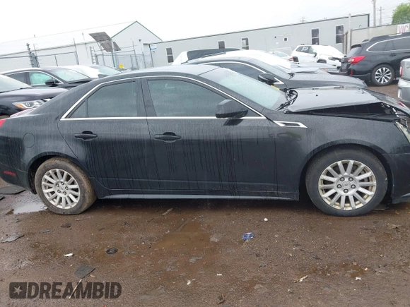 2013 Cadillac CTS Luxury z VIN 1G6DG5E52D0111849, wystawiony jako IAAI lot #42130235 z przebiegiem 129 993 mil mil oraz . Historia ofert i sprzedaży dostępna na DreamBid. Obrazek 13.