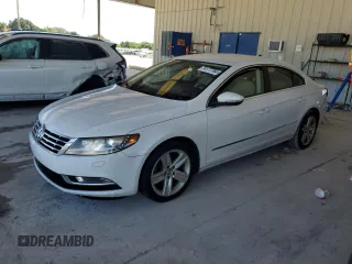 2014 Volkswagen CC R-Line with VIN WVWBP7AN6EE521807, listed as a Copart auction lot 74177764 with 142,779 mi miles and Clean Title. Bid and sale history available at carsss.com. Image 1.