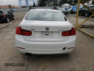 2013 BMW 3 Series 328i xDrive with VIN WBA3B5G59DNS04579, listed as a Copart auction lot 50445404 with 115,404 mi miles and Salvage title. Bid and sale history available at DreamBid. Image 6.