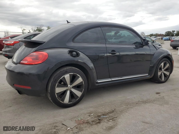 2012 Volkswagen Beetle 2.0T Turbo w/Sun/Sound with VIN 3VWV67AT2CM664806, listed as a Copart auction lot 86595164 with 158,239 mi miles and Salvage Title. Bid and sale history available at carsss.com. Image 3.
