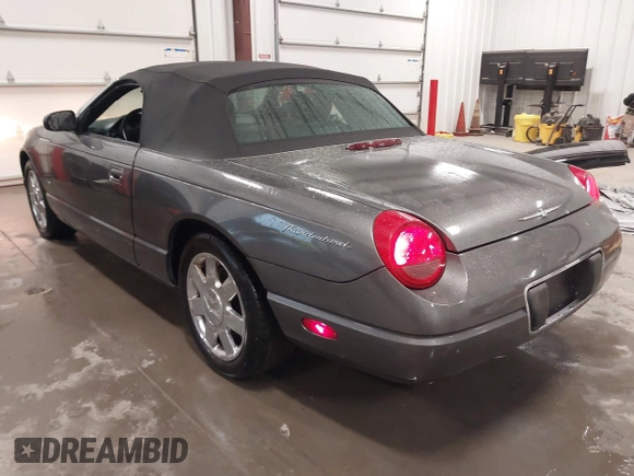 2003 Ford Thunderbird Deluxe z VIN 1FAHP60A53Y113819, wystawiony jako IAAI lot #41724732 z przebiegiem Nie podano mil oraz . Historia ofert i sprzedaży dostępna na DreamBid. Obrazek 3.