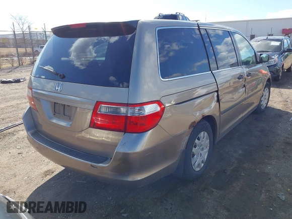 2005 Honda Odyssey LX with VIN 5FNRL382X5B020240, listed as a IAAI auction lot 41888045 with 184,269 mi miles. Bid and sale history available at carsss.com. Image 4.