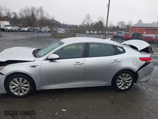 2017 Kia Optima EX with VIN 5XXGU4L37HG129248, listed as a IAAI auction lot 40833561 with 120,671 mi miles. Bid and sale history available at carsss.com. Image 13.