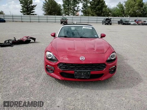 2017 FIAT 124 Spider Lusso z VIN JC1NFAEK5H0123760, wystawiony jako Copart lot #55865845 z przebiegiem 52 285 mil mil oraz Szkoda całkowita • Salvage title. Historia ofert i sprzedaży dostępna na DreamBid. Obrazek 13.