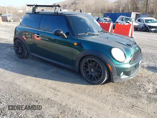 2007 MINI Hardtop S with VIN WMWMF73577TL89211, listed as a IAAI auction lot 41523679 with 136,705 mi miles and . Bid and sale history available at DreamBid. Image 1.