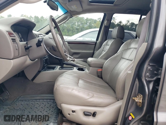 2004 Jeep Grand Cherokee Limited with VIN 1J8GX58N24C333403, listed as a Copart auction lot 73708764 with 145,471 mi miles and Salvage Title. Bid and sale history available at DreamBid. Image 7.