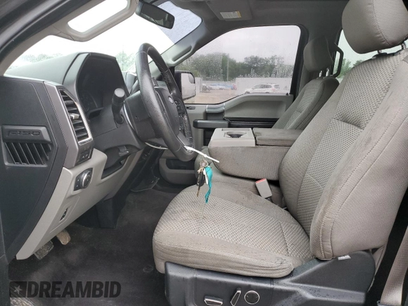 2015 Ford F-150 XLT с VIN 1FTEW1EG9FKE09398, выставлен на аукционе Copart как лот 60234065 с пробегом 128 317 миль миль и Списание • Salvage title. История ставок и продаж доступна на DreamBid. Изображение 7.