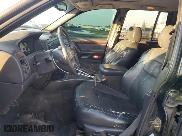 2001 Jeep Grand Cherokee Limited with VIN 1J4GX58S01C652737, listed as a Copart auction lot 81635494 with 175,498 mi miles and Salvage Title. Bid and sale history available at DreamBid. Image 7.