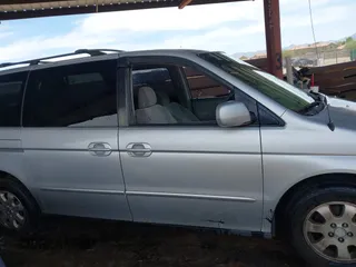 2002 Honda Odyssey EX with VIN 5FNRL18662B034817, listed as a IAAI auction lot 42359186 with 209,348 mi miles and . Bid and sale history available at DreamBid. Image 13.