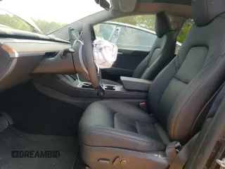 2024 Tesla Model Y Long Range z VIN 7SAYGDEE3RA323029, wystawiony jako Copart lot #50171805 z przebiegiem Nie podano mil oraz Szkoda całkowita • Salvage title. Historia ofert i sprzedaży dostępna na DreamBid. Obrazek 7.