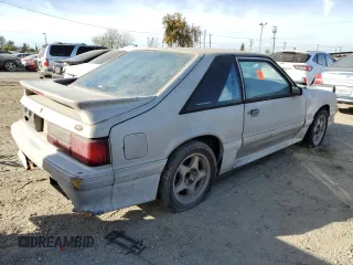 1988 Ford Mustang with VIN 1FABP41A7JF117002, listed as a Copart auction lot 84570564 with 63,626 mi miles and Clean title. Bid and sale history available at DreamBid. Image 3.