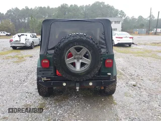 2000 Jeep Wrangler Sahara with VIN 1J4FA59SXYP701098, listed as a IAAI auction lot 41592872 with 1 mi miles. Bid and sale history available at carsss.com. Image 15.
