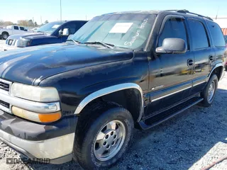 2001 Chevrolet Tahoe LT with VIN 1GNEC13T41J155954, listed as a IAAI auction lot 41810200 with 222,109 mi miles. Bid and sale history available at carsss.com. Image 6.