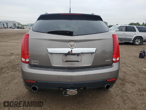 2012 Cadillac SRX Performance Collection z VIN 3GYFNBE35CS536105, wystawiony jako Copart lot #57588275 z przebiegiem 96 359 mil mil oraz Szkoda całkowita • Salvage title. Historia ofert i sprzedaży dostępna na DreamBid. Obrazek 6.