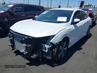 2020 Honda Civic LX with VIN 2HGFC2F67LH511473, listed as a IAAI auction lot 42614633 with 91,822 mi miles and . Bid and sale history available at DreamBid. Image 2.