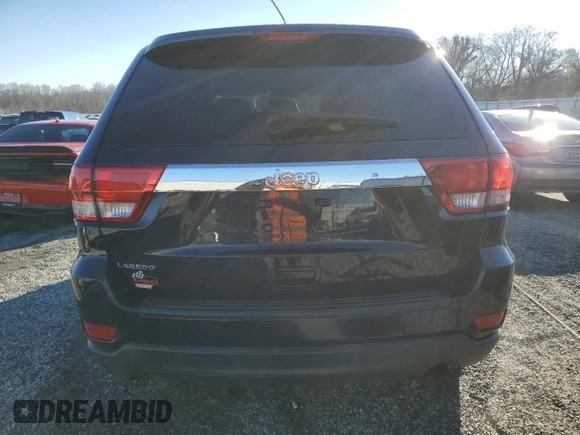 2013 Jeep Grand Cherokee Laredo with VIN 1C4RJEAG6DC561496, listed as a Copart auction lot 45977855 with 253,615 mi miles and Salvage Title. Bid and sale history available at carsss.com. Image 6.