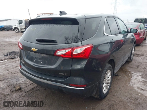 2020 Chevrolet Equinox LT with VIN 2GNAXUEV9L6229579, listed as a IAAI auction lot 41512031 with 96,446 mi miles and . Bid and sale history available at DreamBid. Image 4.
