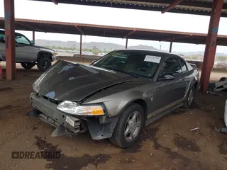 2002 Ford Mustang Standard z VIN 1FAFP40482F157569, wystawiony jako IAAI lot #42372535 z przebiegiem 76 944 mil mil oraz . Historia ofert i sprzedaży dostępna na DreamBid. Obrazek 2.