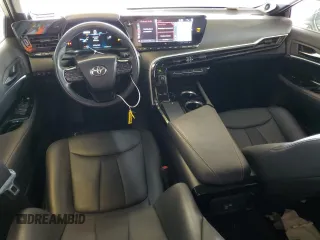 2022 Toyota Mirai XLE with VIN JTDAAAAAXNA007389, listed as a Copart auction lot 58393325 with 27,317 mi miles and Salvage title. Bid and sale history available at DreamBid. Image 8.