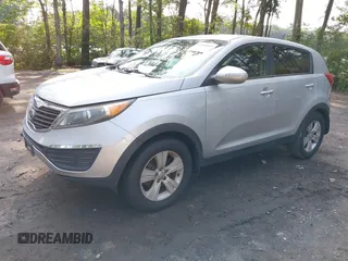 2012 Kia Sportage LX with VIN KNDPB3A2XC7334509, listed as a IAAI auction lot 42441009 with 253,302 mi miles and . Bid and sale history available at DreamBid. Image 2.
