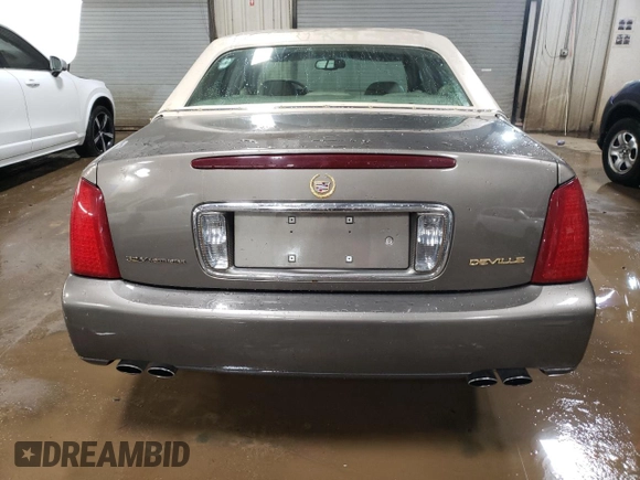 2003 Cadillac DeVille with VIN 1G6KD54Y43U124198, listed as a Copart auction lot 44515215 with 116,006 mi miles and Salvage Title. Bid and sale history available at carsss.com. Image 6.
