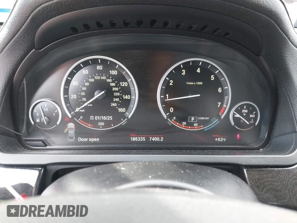 2012 BMW 7 Series 750Li with VIN WBAKB8C50CC963330, listed as a IAAI auction lot 41286275 with 186,335 mi miles. Bid and sale history available at carsss.com. Image 7.