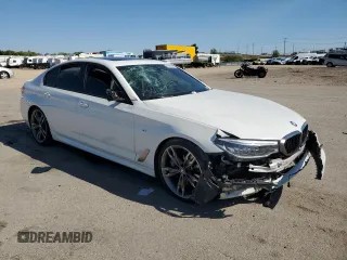 2018 BMW 5 Series M550i xDrive with VIN WBAJB9C51JB287233, listed as a Copart auction lot 55899505 with Not provided miles and Salvage title. Bid and sale history available at DreamBid. Image 4.