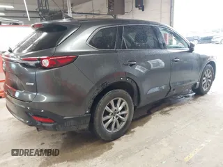 2017 Mazda CX-9 Touring with VIN JM3TCBCY1H0127229, listed as a IAAI auction lot 42320263 with 85,890 mi miles and . Bid and sale history available at DreamBid. Image 4.